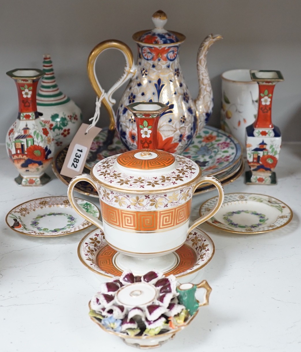 A selection of English porcelain and ceramics, to include a two handled Wedgwood Queensware urn, cover and stand, c.1800, two 19th century Worcester pierced bordered dishes, etc.